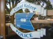 Keizer PD mirrored sign